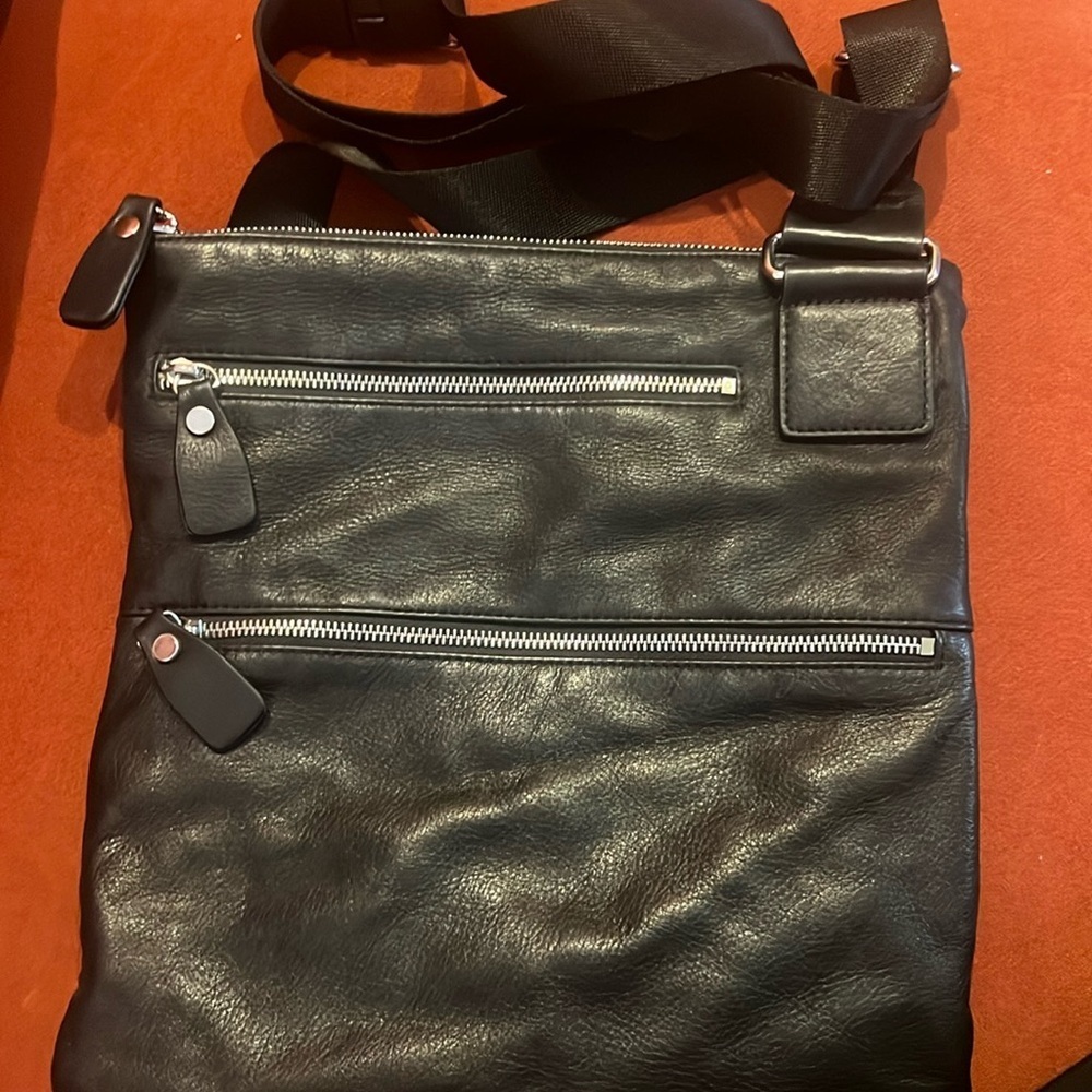 Margot black leather shoulder bag with zipper pocket detail. Used 1x 12x12